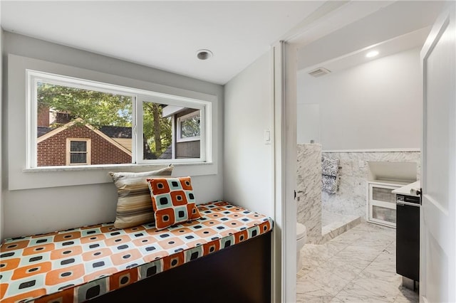 311 Glendale Ave, Decatur, GA 30030 - bathroom featuring marble finish flooring, a wainscoted wall, tile walls, and recessed lighting