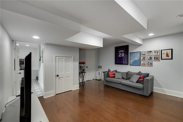 311 Glendale Ave, Decatur, GA 30030 - living area featuring dark wood-style floors, recessed lighting, and radiator heating unit