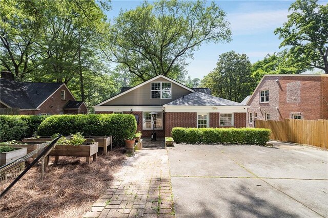 311 Glendale Ave, Decatur, GA 30030 - bungalow with a vegetable garden and brick siding