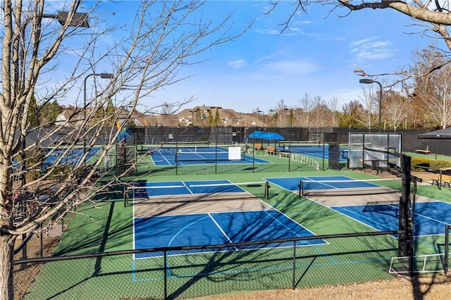 view of sport court with fence and community basketball court