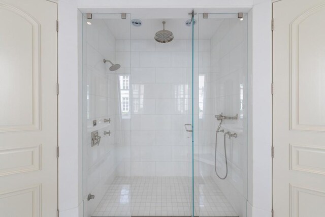 bathroom with a shower stall