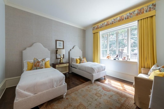 bedroom featuring wallpapered walls, dark wood-style flooring, baseboards, and ornamental molding