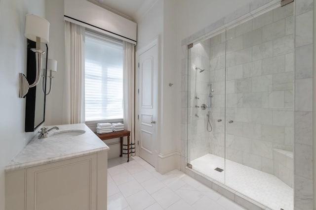 bathroom featuring a stall shower and vanity