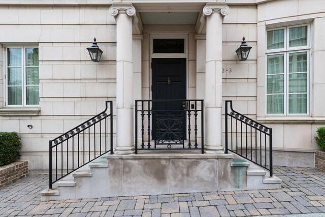 view of exterior entry with stone siding