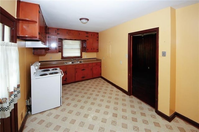 kitchen featuring white range with electric stovetop and sink