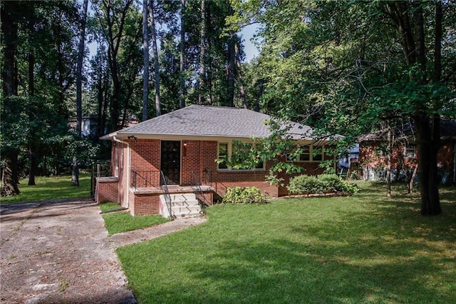 view of front of home with a front lawn