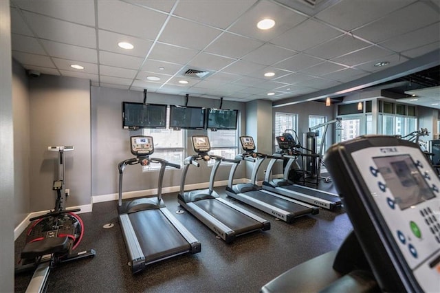 943 Peachtree St NE Unit 1518, Atlanta, GA 30309 - gym with a paneled ceiling and baseboards