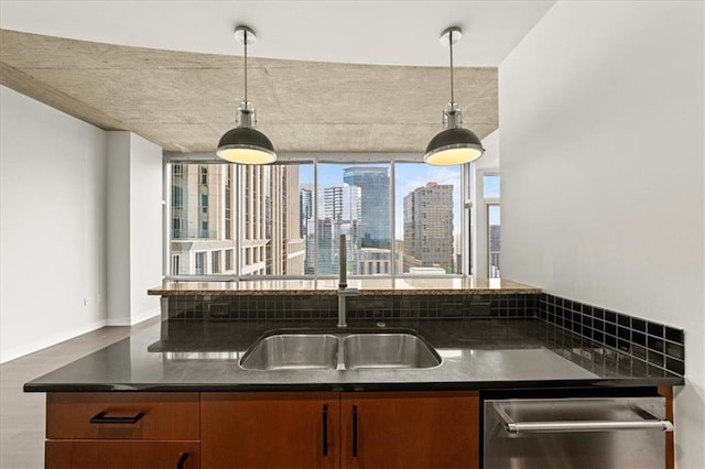 943 Peachtree St NE Unit 1518, Atlanta, GA 30309 - kitchen with dishwasher, a sink, a view of city, brown cabinets, and pendant lighting