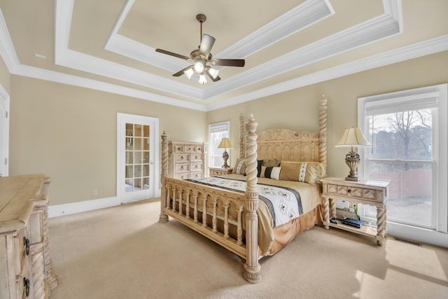 2740 Heritage Bend Ct SW, Grayson, GA 30017 - bedroom with a raised ceiling, multiple windows, crown molding, carpet flooring, and ceiling fan