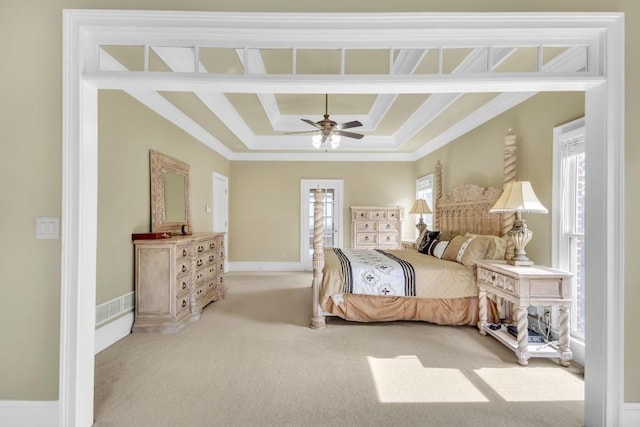 2740 Heritage Bend Ct SW, Grayson, GA 30017 - bedroom featuring crown molding, carpet floors, baseboards, a tray ceiling, and ceiling fan