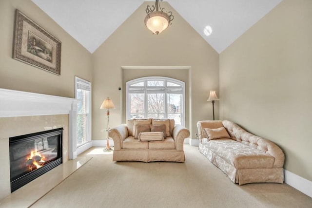 2740 Heritage Bend Ct SW, Grayson, GA 30017 - living room featuring carpet flooring, high vaulted ceiling, a high end fireplace, and baseboards