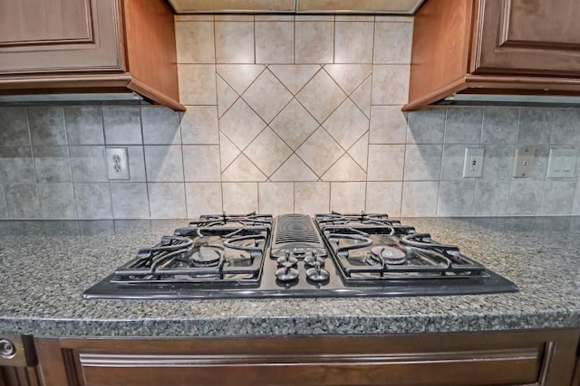 2740 Heritage Bend Ct SW, Grayson, GA 30017 - kitchen featuring black gas cooktop and tasteful backsplash