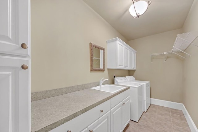 2740 Heritage Bend Ct SW, Grayson, GA 30017 - washroom featuring washing machine and dryer, cabinet space, baseboards, and light tile patterned floors