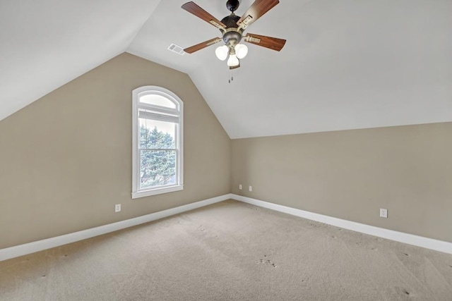 2740 Heritage Bend Ct SW, Grayson, GA 30017 - bonus room with baseboards, lofted ceiling, ceiling fan, and light colored carpet