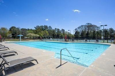 2740 Heritage Bend Ct SW, Grayson, GA 30017 - community pool featuring a patio