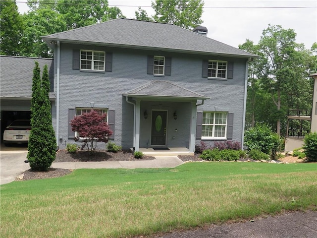 4039 Sargent Cir, Gainesville, GA 30506 - view of front of property featuring a front yard, brick siding, a chimney, and roof with shingles