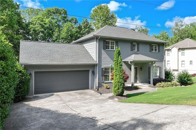 4039 Sargent Cir, Gainesville, GA 30506 - colonial inspired home with driveway, a garage, a front lawn, and roof with shingles