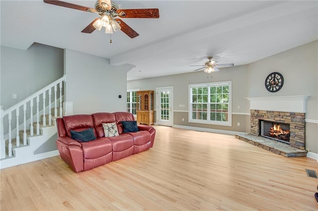 4039 Sargent Cir, Gainesville, GA 30506 - living area with a ceiling fan, wood finished floors, stairway, and baseboards