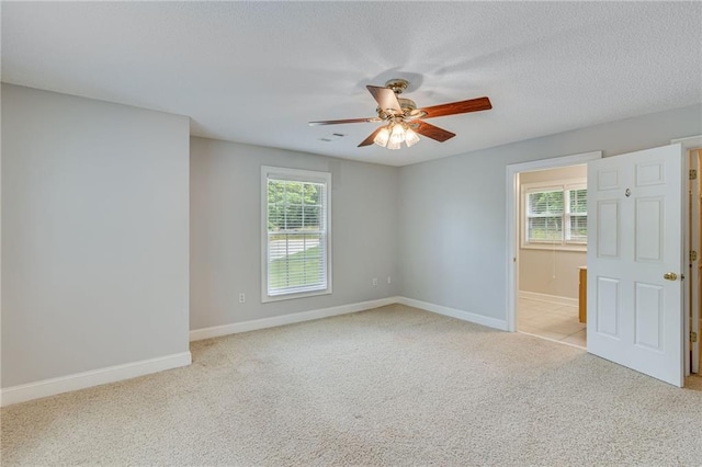 4039 Sargent Cir, Gainesville, GA 30506 - empty room featuring plenty of natural light, ceiling fan, light colored carpet, and a textured ceiling