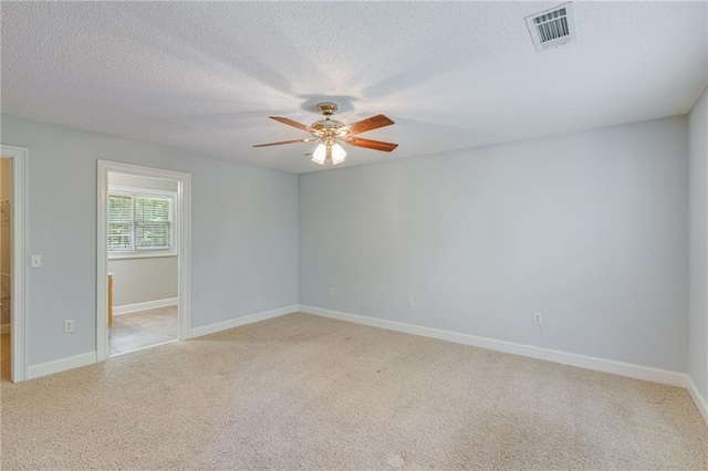 4039 Sargent Cir, Gainesville, GA 30506 - empty room with a ceiling fan, light colored carpet, a textured ceiling, and baseboards