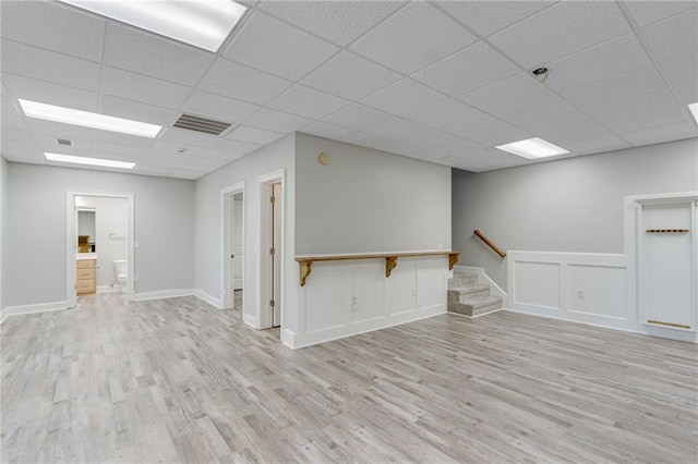 4039 Sargent Cir, Gainesville, GA 30506 - empty room featuring a paneled ceiling, wood finished floors, and stairs