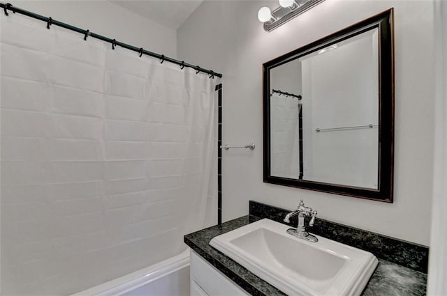 bathroom featuring vanity and shower / bath combo with shower curtain