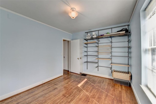 garage with visible vents and baseboards