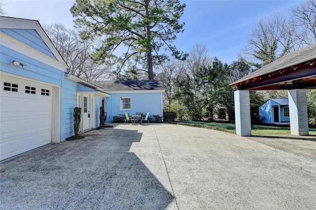 exterior space with an attached garage and driveway