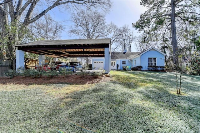 exterior space featuring a detached carport and dirt driveway