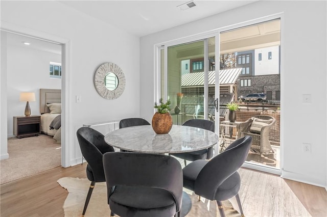 388 Pratt Dr Unit 2113, Atlanta, GA 30315 - dining space featuring wood finished floors and baseboards