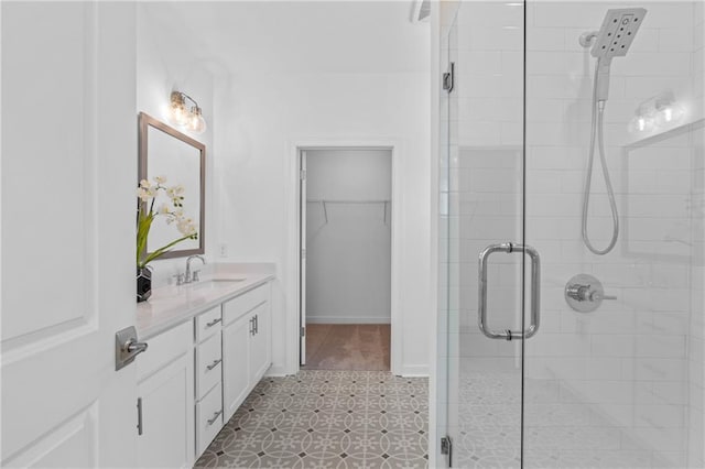 388 Pratt Dr Unit 2113, Atlanta, GA 30315 - full bath with a stall shower, vanity, and a walk in closet