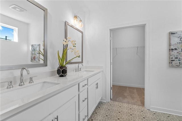 388 Pratt Dr Unit 2113, Atlanta, GA 30315 - bathroom with double vanity and a walk in closet