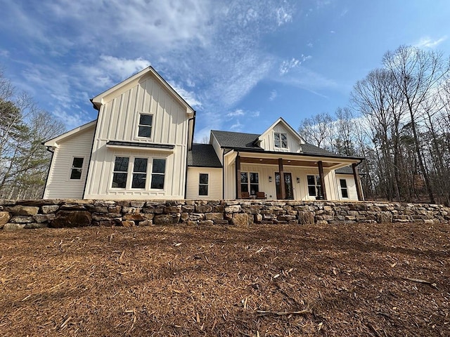 2226 Upper Burris Rd, Canton, GA 30114 - modern farmhouse style home featuring board and batten siding and covered porch