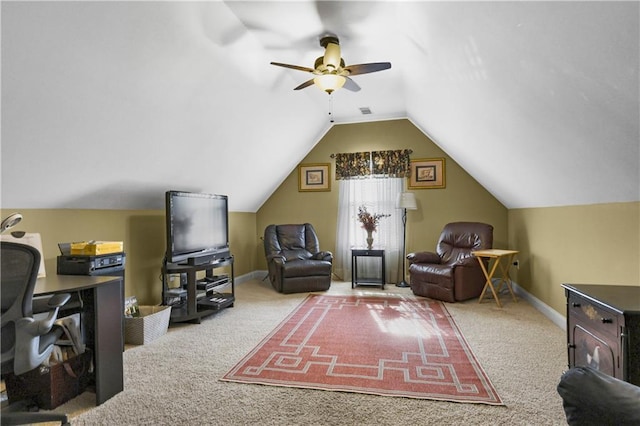 interior space featuring ceiling fan and vaulted ceiling