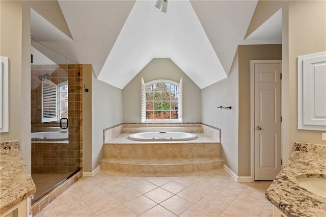 full bathroom with vanity, a shower stall, and a garden tub