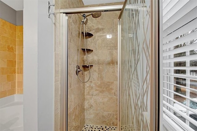 full bathroom featuring a shower stall