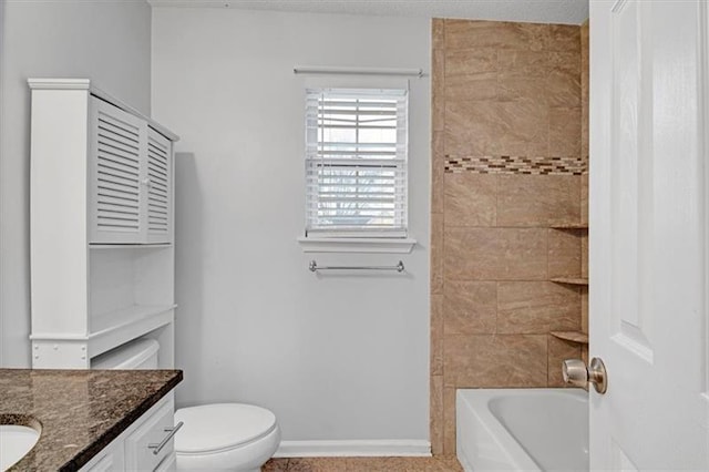 full bath featuring shower / washtub combination, toilet, vanity, and baseboards