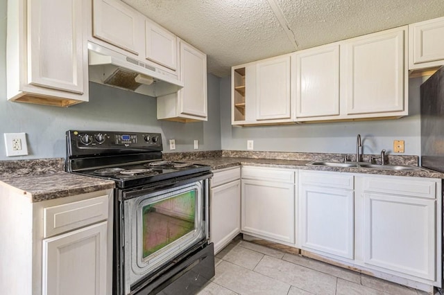 kitchen featuring sink, a textured ceiling, black / electric stove, light tile patterned flooring, and white cabinetry