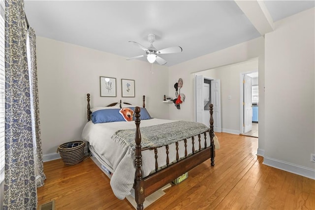 511 Robinson Ave SE, Atlanta, GA 30315 - bedroom with light wood finished floors, baseboards, and ceiling fan