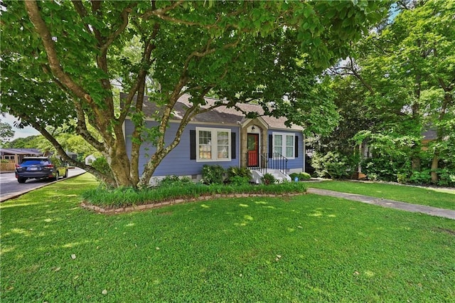511 Robinson Ave SE, Atlanta, GA 30315 - view of front of property with a front yard and a shingled roof