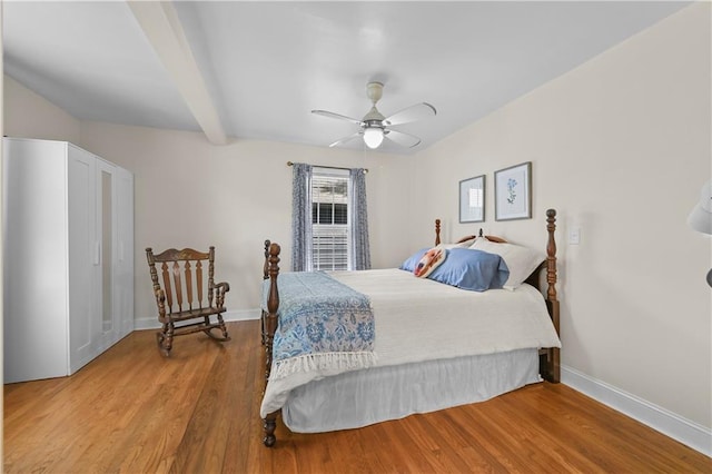 511 Robinson Ave SE, Atlanta, GA 30315 - bedroom with wood finished floors, baseboards, beamed ceiling, and a ceiling fan