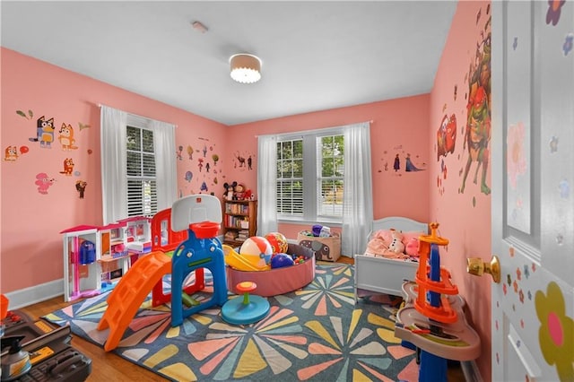 511 Robinson Ave SE, Atlanta, GA 30315 - rec room with baseboards
