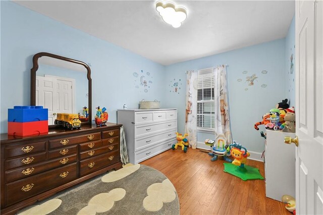 511 Robinson Ave SE, Atlanta, GA 30315 - bedroom featuring hardwood / wood-style flooring and baseboards