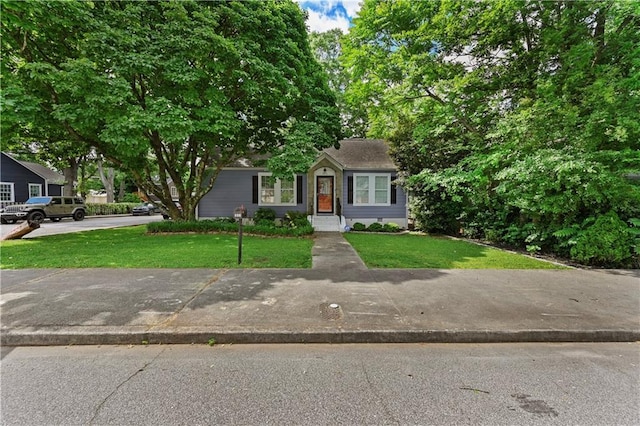 511 Robinson Ave SE, Atlanta, GA 30315 - obstructed view of property featuring a front lawn