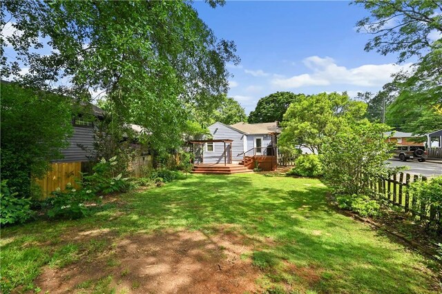 511 Robinson Ave SE, Atlanta, GA 30315 - view of yard featuring a wooden deck