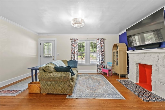511 Robinson Ave SE, Atlanta, GA 30315 - sitting room featuring a fireplace, wood finished floors, baseboards, and ornamental molding