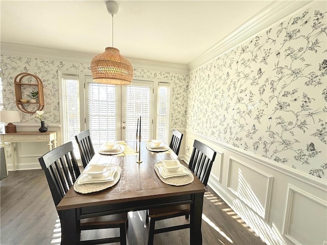 dining room featuring dark hardwood / wood-style floors and ornamental molding