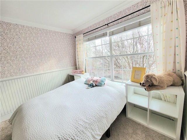 carpeted bedroom with crown molding