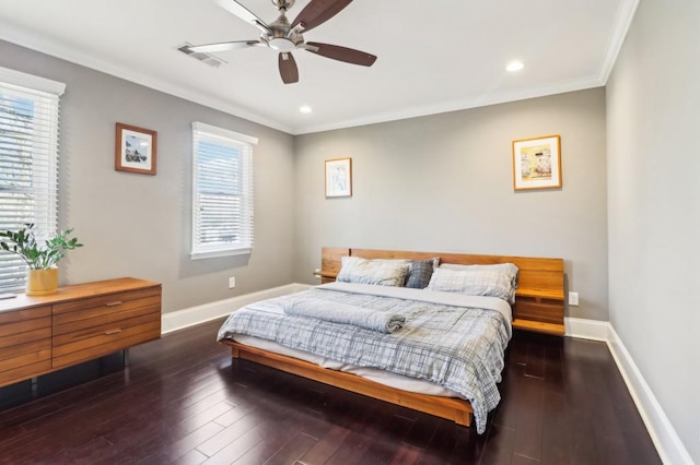 bedroom with dark wood-type flooring, ceiling fan, and ornamental molding