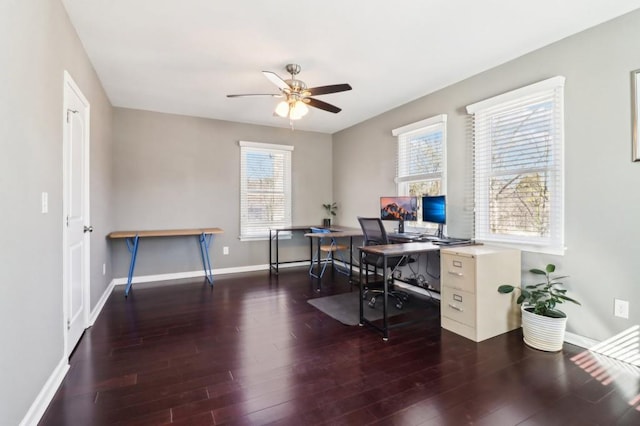 office area with dark wood-type flooring and ceiling fan